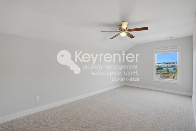 Building Photo - Located in Westfield, IN, this attractive 3-bedroom, 2.5-bath home sits on a corner lot within an...