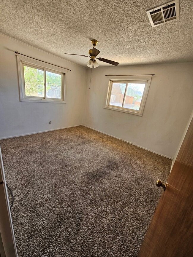 Building Photo - Property with a carport and laundry.