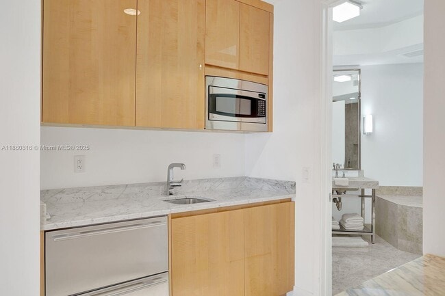Building Photo - 9703 Collins Ave