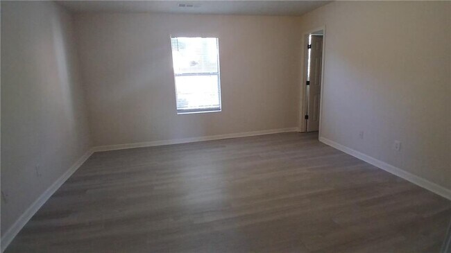 Building Photo - 5677 Wind Gate Ln