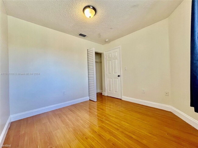 Building Photo - 3 br, 2.5 bath Condo - 8625 SW 152nd Ave A...