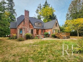 Building Photo - Waterfront Tudor | Private, Vintage Charm