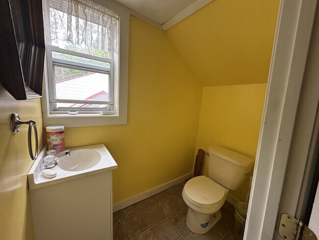Building Photo - Charming 3BR Waterfront Retreat with Sunroom, Brick Accent & Scenic Lake Views