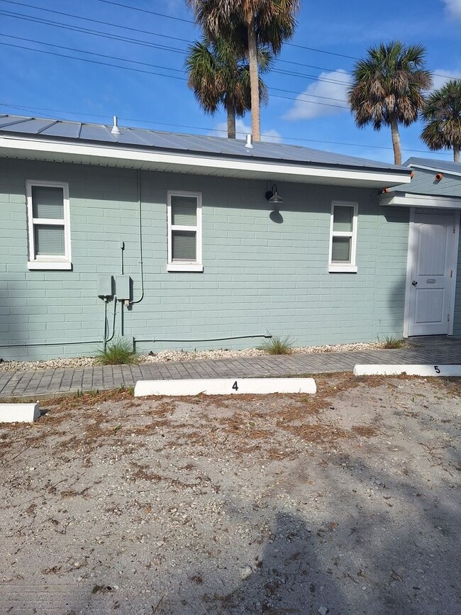 Building Photo - NSB FURNISHED EFFICIENCY UNIT-ALL UTILITIES INCLUDED INCLUDING WI-FI!