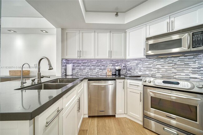 Building Photo - 6767 Collins Ave
