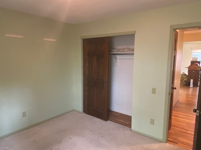 Front bedroom, closet open - 8520 W 81st Dr