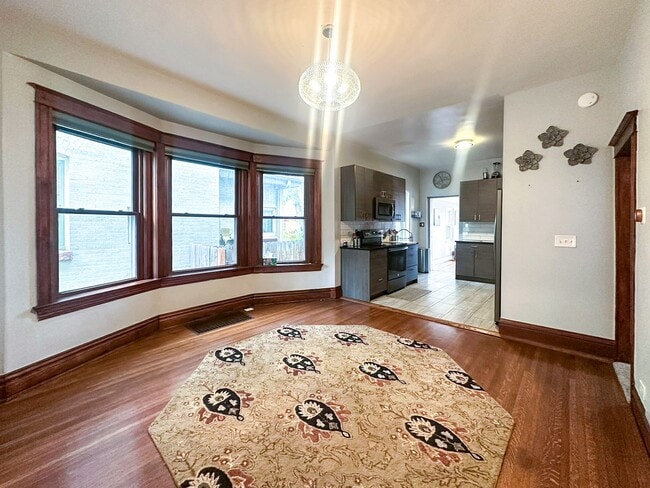 Building Photo - A home where old-world charm meets modern sophistication!