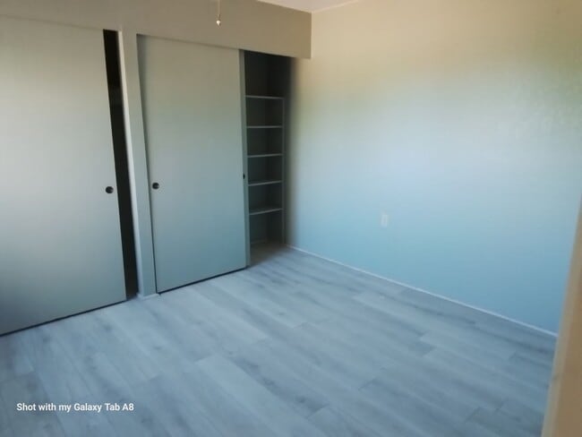 Building Photo - Unfurnished end unit townhome  55 and older community