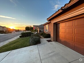 Building Photo - Beautiful Upgraded 4 Bedroom in Gated Comm...