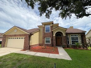 Building Photo - Beautiful 4BR/2.5BA Water View Home - Deer Hollow in the Deerfield Community!