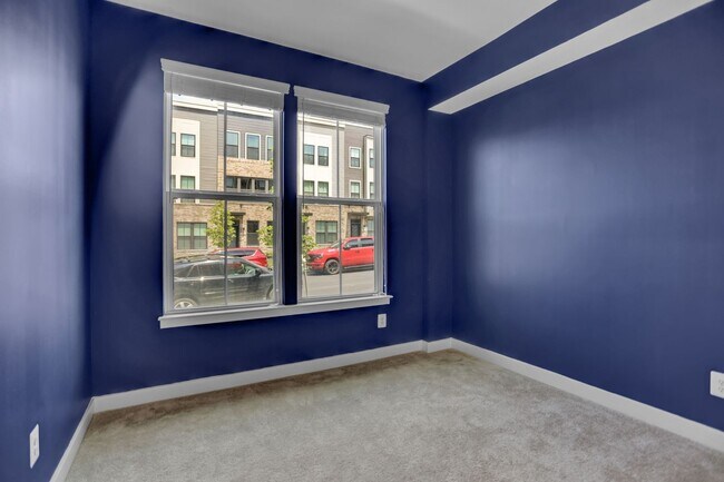 Building Photo - Luxury 4-Story Townhome with Rooftop Terrace!