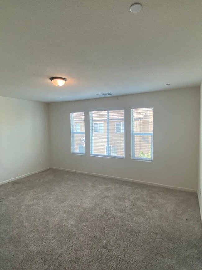 Building Photo - Almost new! Gated 4 Bdrm, 2.5 Bath Solar Home