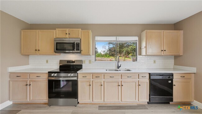 Building Photo - 7338 Raintree Forest