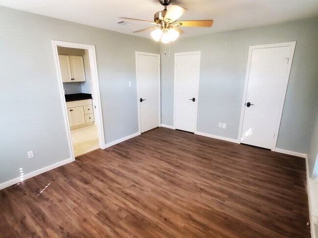 Bedroom 4 features two large walk-in closets and direct access to the hallway bathroom. - 37438 Meadowview Dr