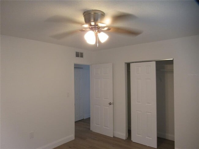 Building Photo - 7374 Royal Palm Dr