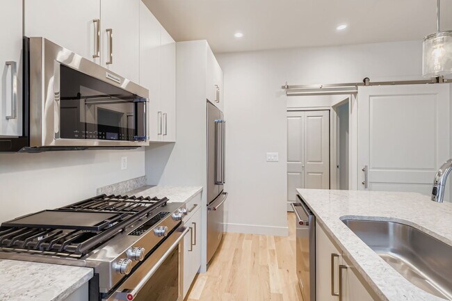 Building Photo - Swanky 1BR – New, Private Garage, Storage,...