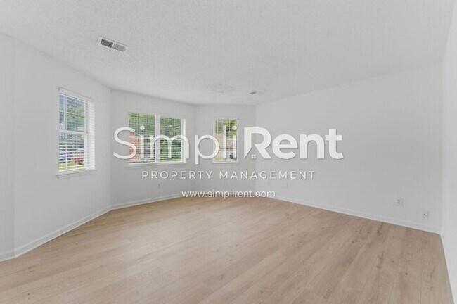 Building Photo - Updated Home with Spacious Layout & Private Backyard