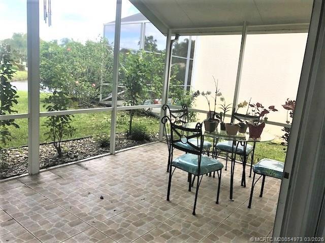 Building Photo - 3486 SW Pindo Palm Ln