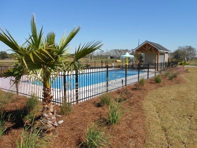 Building Photo - Modern 4BR Home with Open Layout, Granite Counters & Community Pool Access