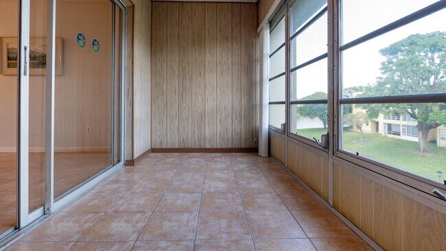 Building Photo - 5890 NW 64th Ave