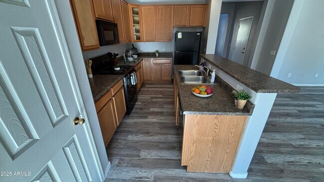 Building Photo - 14719 W Poinsettia Dr