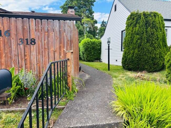 Building Photo - Bright 2 BR Carter Park Living with Fireplace, Carport, and Tons of Storage!