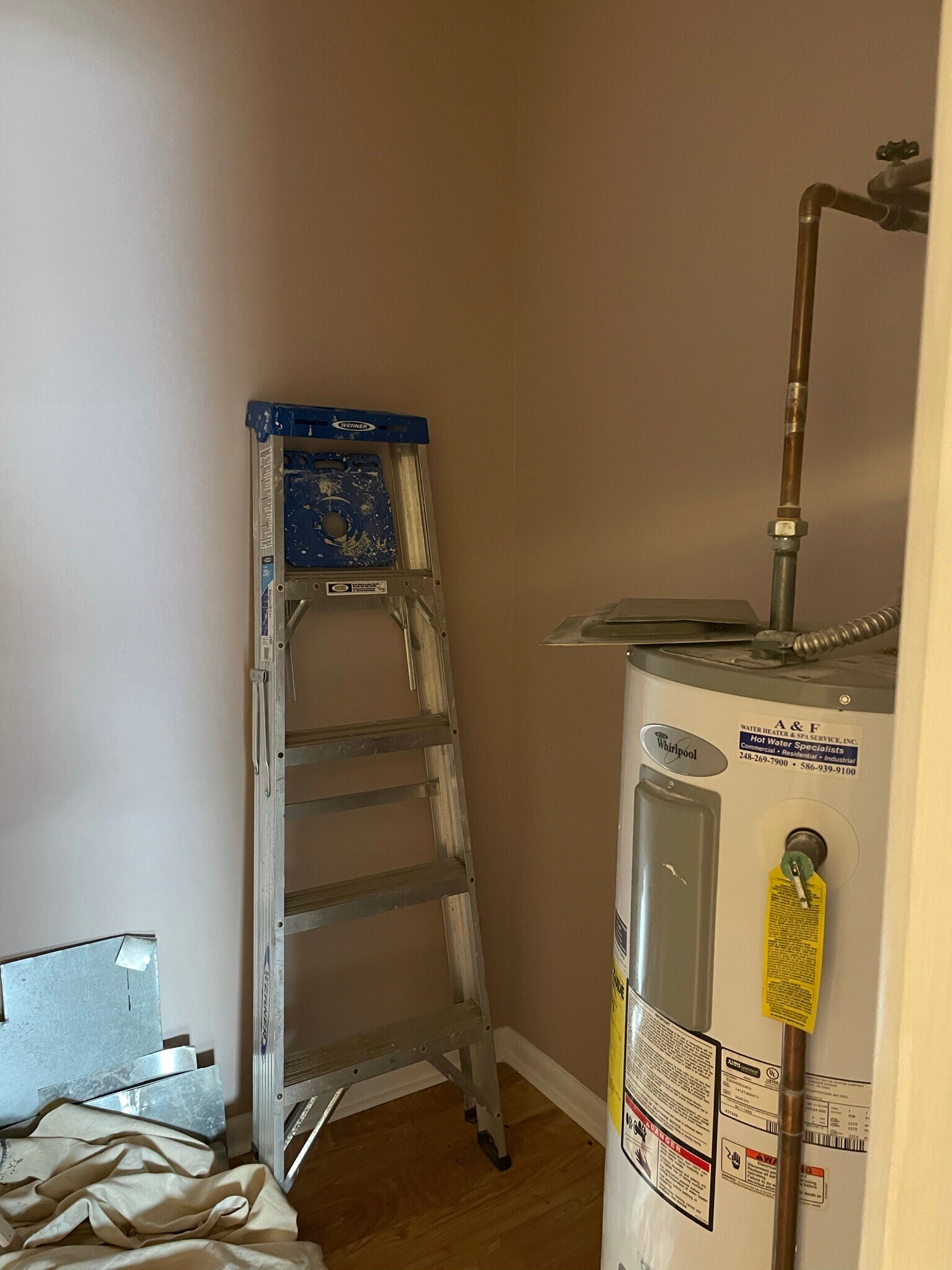 Storage closet with private hot water tank - 1804 Colonial Village Way