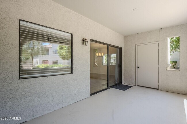 Building Photo - 9455 E Raintree Dr