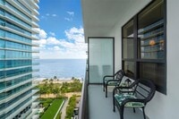 Building Photo - 10185 Collins Ave