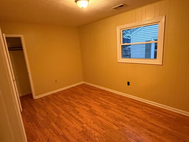 Building Photo - Updated 4BR Home with Finished Basement & Level Yard