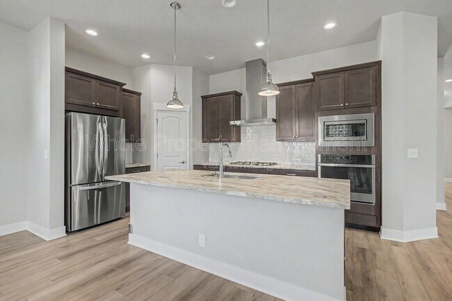 Building Photo - 21087 E 62nd Dr
