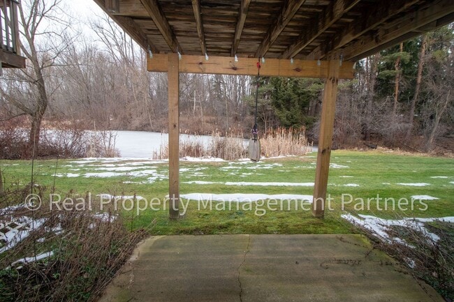 Building Photo - Forest Hills 3 Bed Townhome with Garage, Pond View and Some Utilities Included