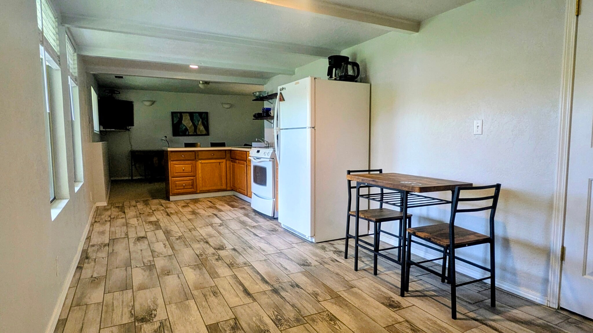 Kitchen with tiled flooring, full oven/range, fridge, double sink - 1135 E Santa Maria Dr