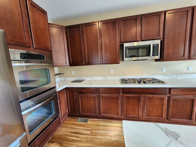 Building Photo - Coming soon! Immaculate 4-Bedroom, 3-Bathroom Home with Solar in Coal Creek Village