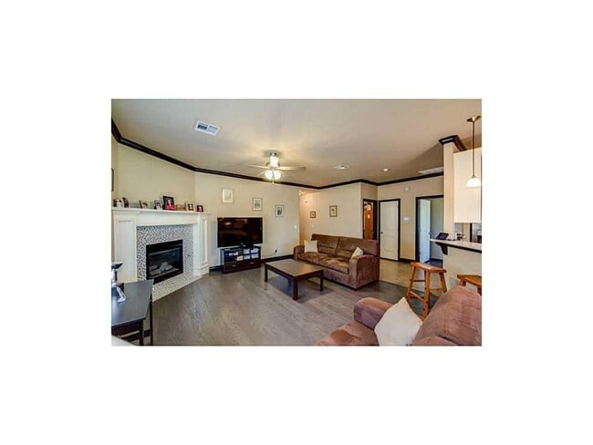 Building Photo - Contemporary Home + Wood Floors + Storm Shelter + Edmond Schools