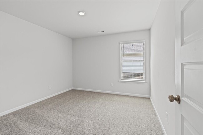 Building Photo - New 4BR Home in Whispering Woods – Spaciou...