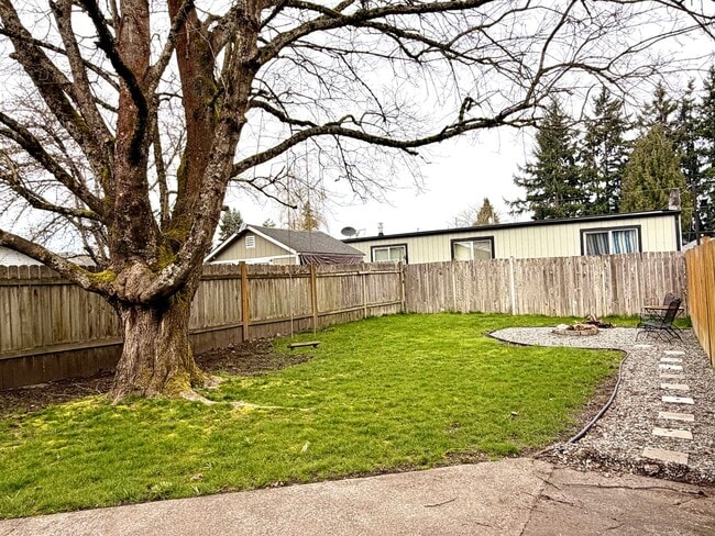 Building Photo - Rare Find! Private Yard + Firepit | Upstairs 1BR with Separate Entrance
