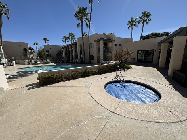 Building Photo - East side condo with community pool/spa/assigned covered parking place