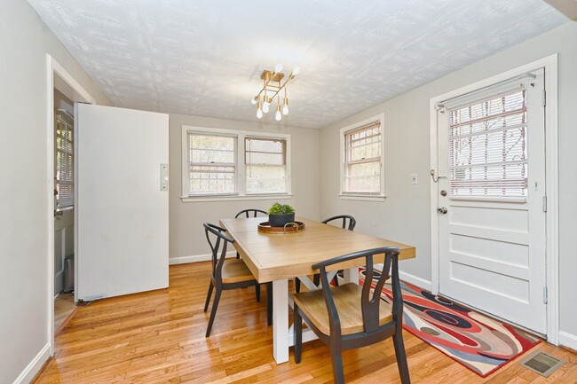 Wonderful light and original oak hard wood floors - 1709 Roger Ave