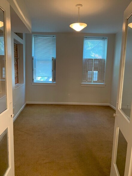 first level living room or bedroom - 1047 S Charles St