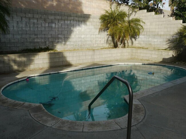 Building Photo - Charming 2-Bed, 2-Bath Pool Home with Fireplace & 2-Car Garage in Quiet Colton Neighborhood