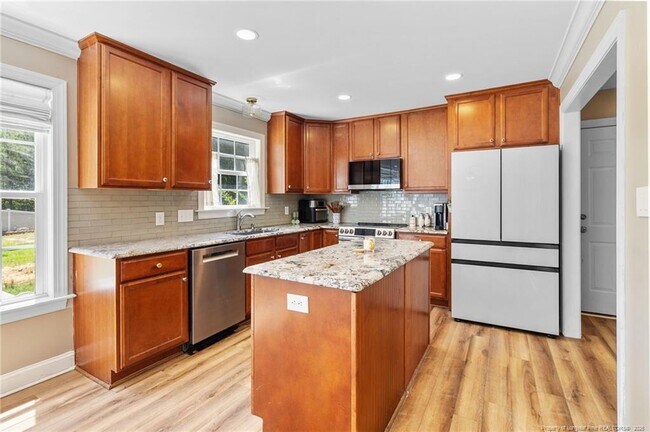 Building Photo - 5802 Rainsford Dr