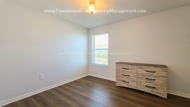 Building Photo - EXCEPTIONAL AND SPACIOUS FURNISHED TOWNHOME WITHIN WATERSIDE- NAUTIQUE!