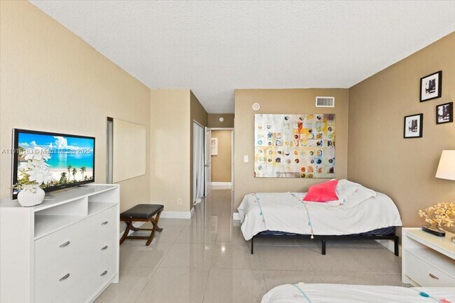 Building Photo - 19380 Collins Ave