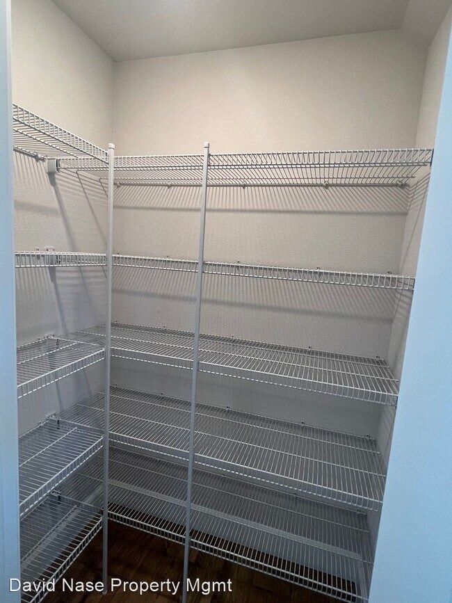 Building Photo - 4 br, 3.5 bath House - 17022 SW Lemongrass...