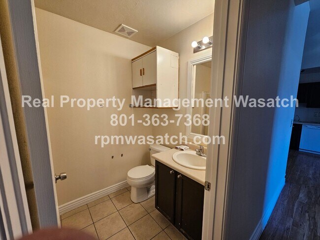 Building Photo - Move In Special!  1/2 Off First Months Rent  Check Out This 3 bed, 2 bath Condo with Hardwood Flo...