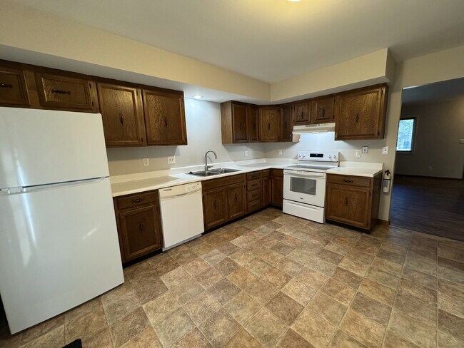 Building Photo - Up Where We Belong — Spacious 2-Story Townhome with Basement