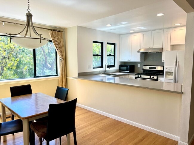 Building Photo - Great Natural light, Treetop Views with 2 Primary Suites plus OFFICE and a 2 car garage, It is li...