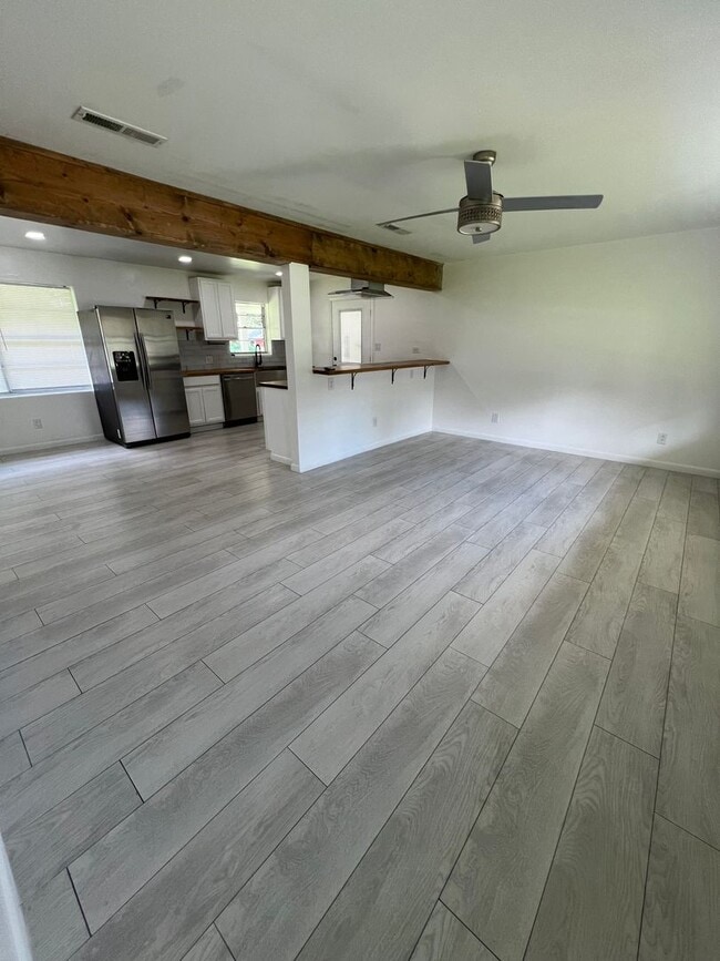 Building Photo - Updated 3BR | Solar Panels + Fenced Yard