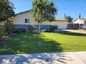 Building Photo - 4 bedroom/ 1 bathroom near schools, park, ...